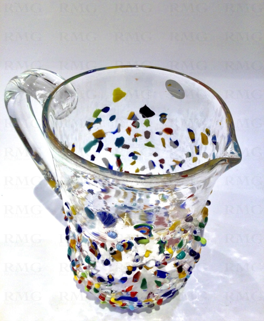 https://www.realmuranoglass.com/cdn/shop/products/transparent-blown-glass-pitcher-with-murrine-519.jpg?v=1612017116